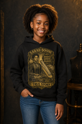 Black youth model wearing the Sarah Boone True Story hoodie in black